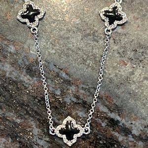 Elegant Silver and Black Clover Necklace